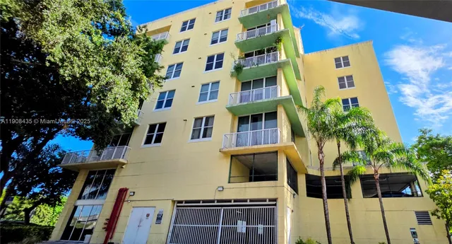 a building view with balcony and outdoor space