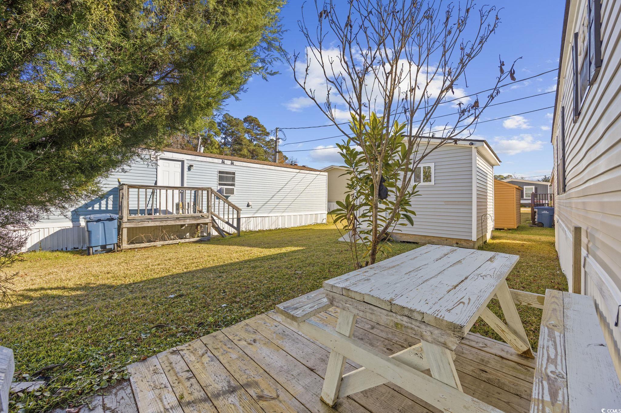 2000 Highway 15 Myrtle Beach, SC 29577 - Photo 22 of 27 Wooden deck featuring a yard
