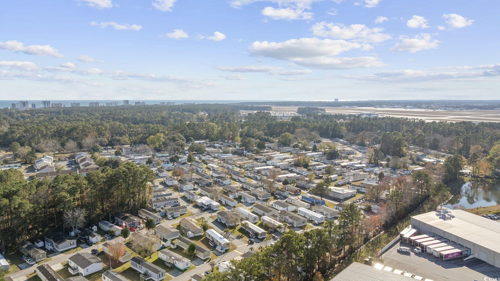2000 Highway 15 Myrtle Beach, SC 29577 - Photo 25 of 27 View of property location with a large body of water and a tree filled landscape