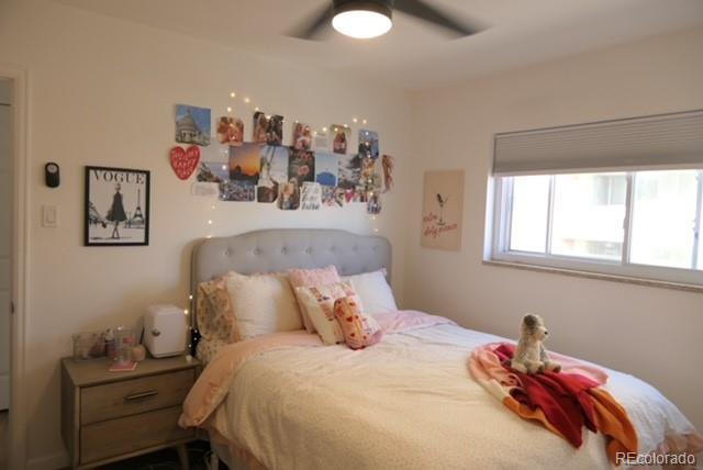 830 20th Street, Unit 303 Boulder, CO 80302 - Photo 11 of 28 a bedroom with a bed and a window