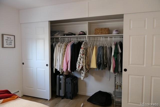 830 20th Street, Unit 303 Boulder, CO 80302 - Photo 13 of 28 a view of walk in closet with clothes and shoes