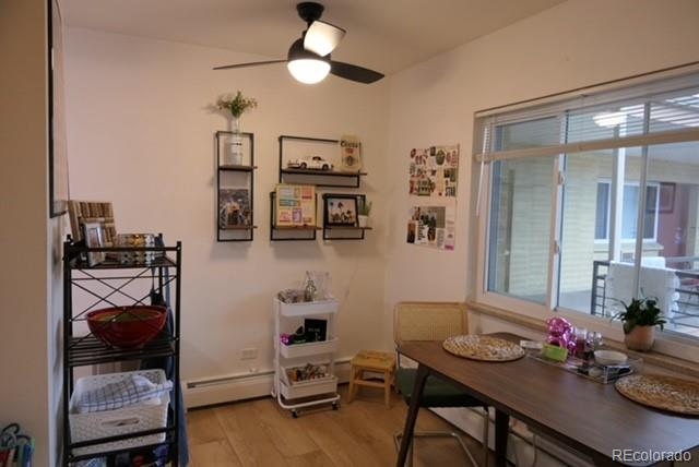 830 20th Street, Unit 303 Boulder, CO 80302 - Photo 16 of 28 a living room with furniture and a window