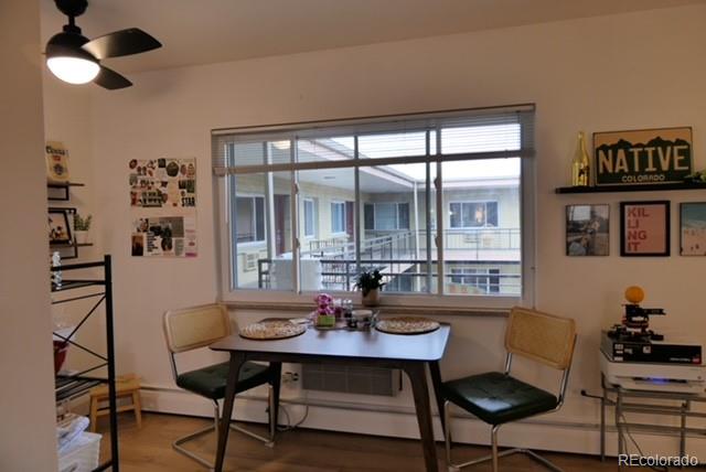 830 20th Street, Unit 303 Boulder, CO 80302 - Photo 17 of 28 a dining room with furniture and window