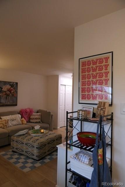 830 20th Street, Unit 303 Boulder, CO 80302 - Photo 18 of 28 a bedroom with a bed and a table in it