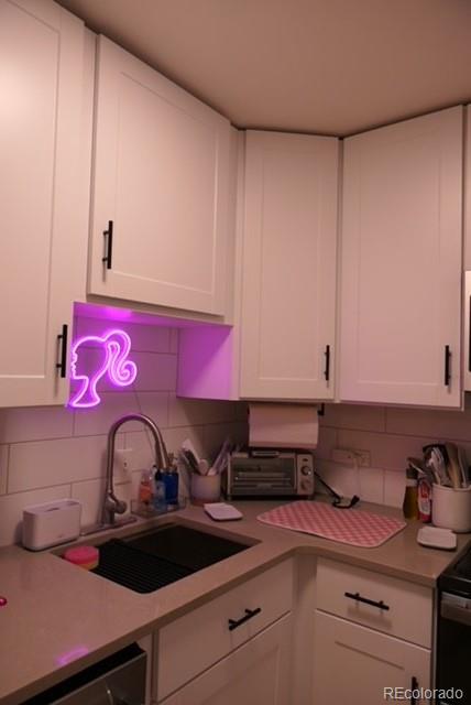 830 20th Street, Unit 303 Boulder, CO 80302 - Photo 22 of 28 a kitchen with a sink and cabinets