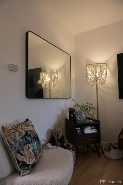 830 20th Street, Unit 303 Boulder, CO 80302 - Photo 5 of 28 a bed room with furniture and a mirror