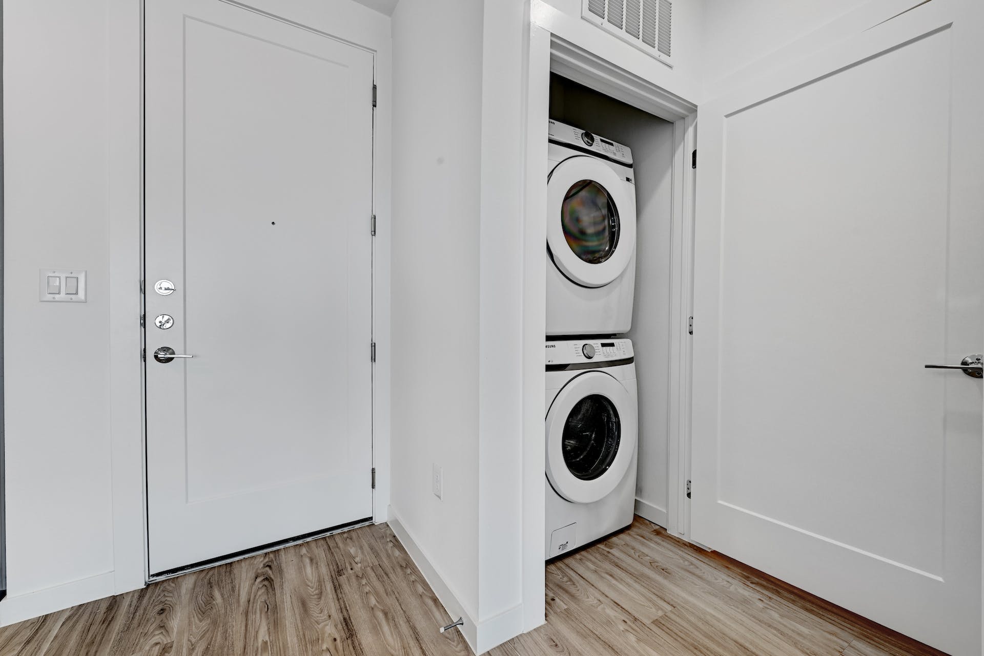 4801 Springdale Road, Unit 1301 Austin, TX 78723 - Photo 21 of 39 A dedicated laundry space provides practical, in-unit convenience for daily chores.