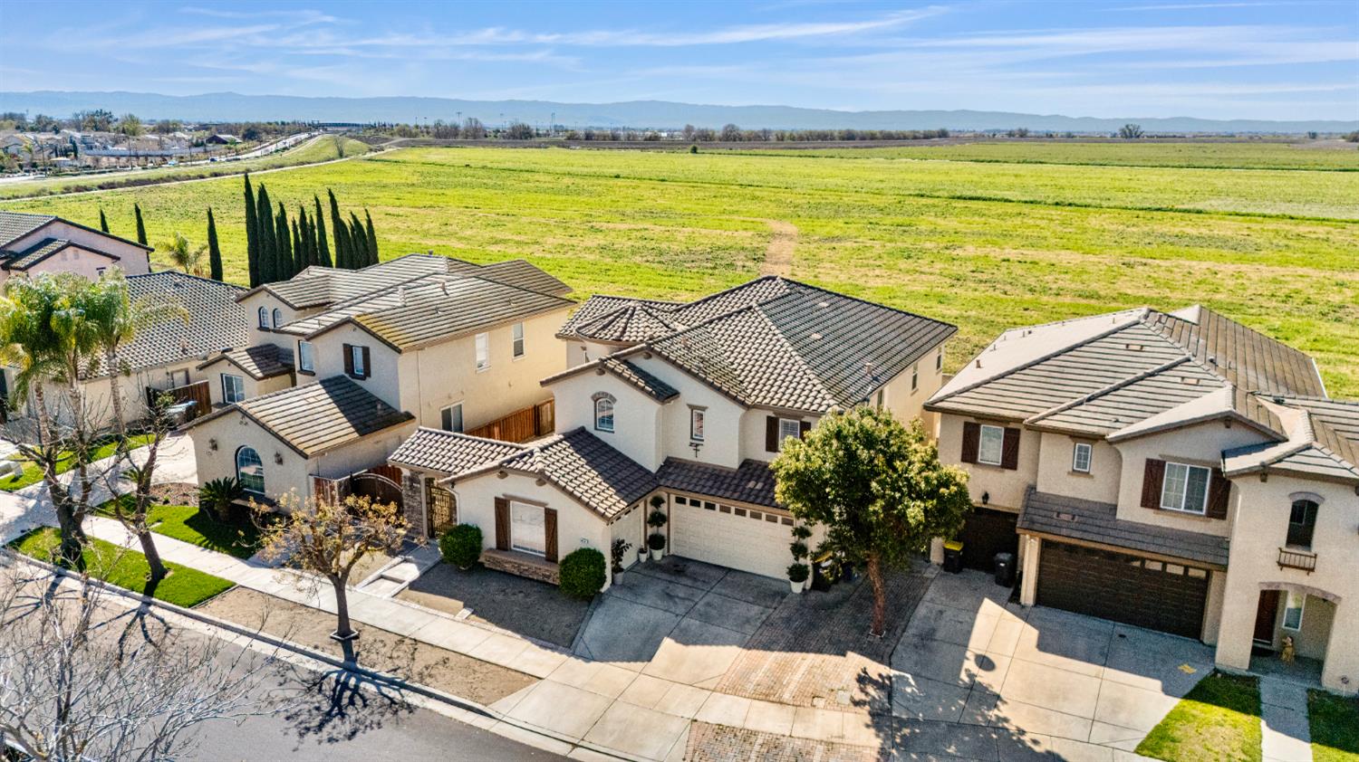 16501 Upper Pasture Lathrop, CA 95330 - Photo 3 of 41 an aerial view of residential houses with outdoor space and ocean view