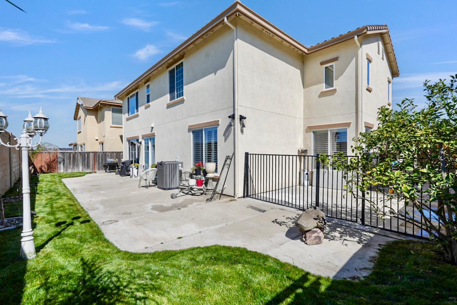 16501 Upper Pasture Lathrop, CA 95330 - Photo 34 of 41 a view of a house with backyard and sitting area
