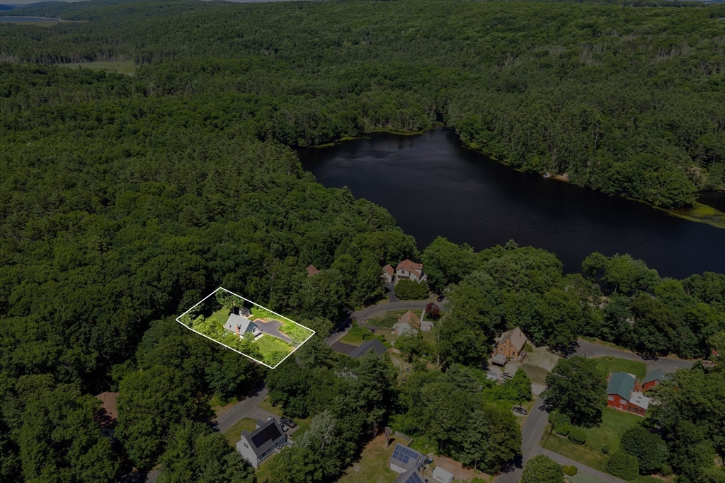 47 Horseshoe Circle Ware, MA 01082 - Photo 34 of 37 an aerial view of a house with pool outdoor space and trees all around