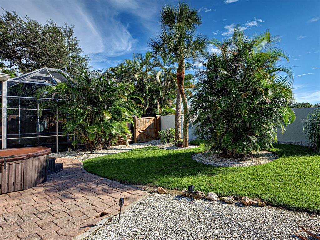 1801 Highland Road Osprey, FL 34229 - Photo 37 of 40 a view of a backyard with sitting area