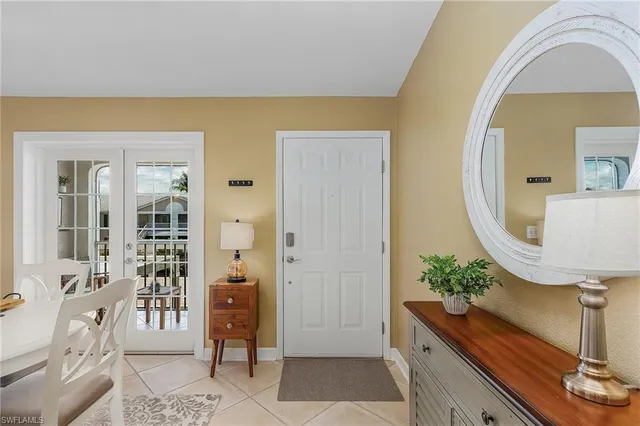 a view of living room filled with furniture and wooden floor