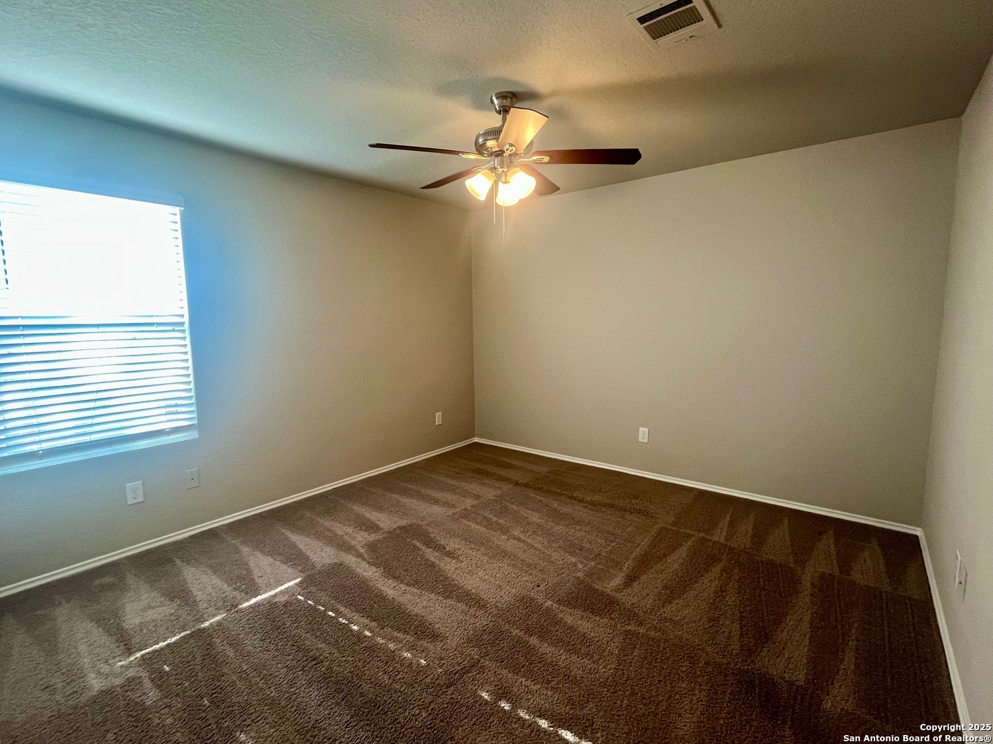 10418 Midsummer Meadow Converse, TX 78109 - Photo 11 of 24 a view of an empty room