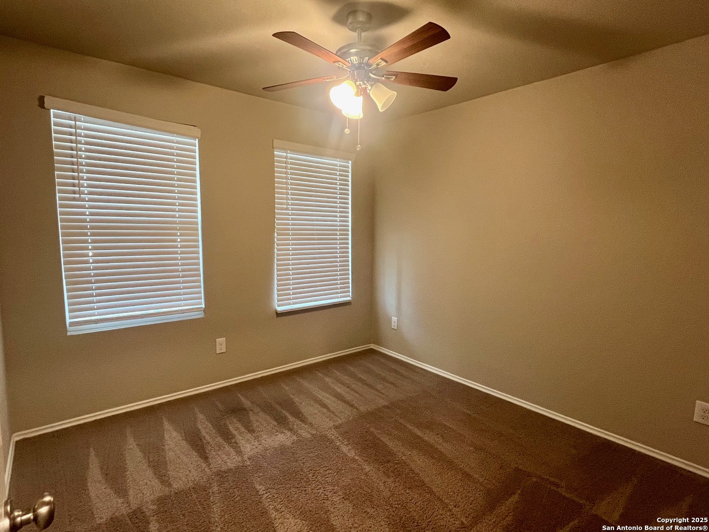 10418 Midsummer Meadow Converse, TX 78109 - Photo 15 of 24 a view of an empty room with a window