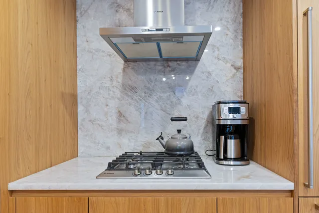 a close view of dining table with wooden floor