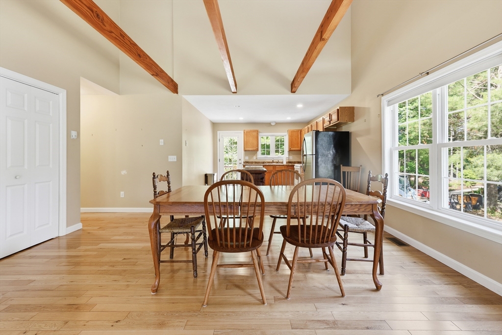 9 Rock Marsh Road, Unit B Wareham, MA 02571 - Photo 12 of 41 a view of a dining room with furniture window and wooden floor