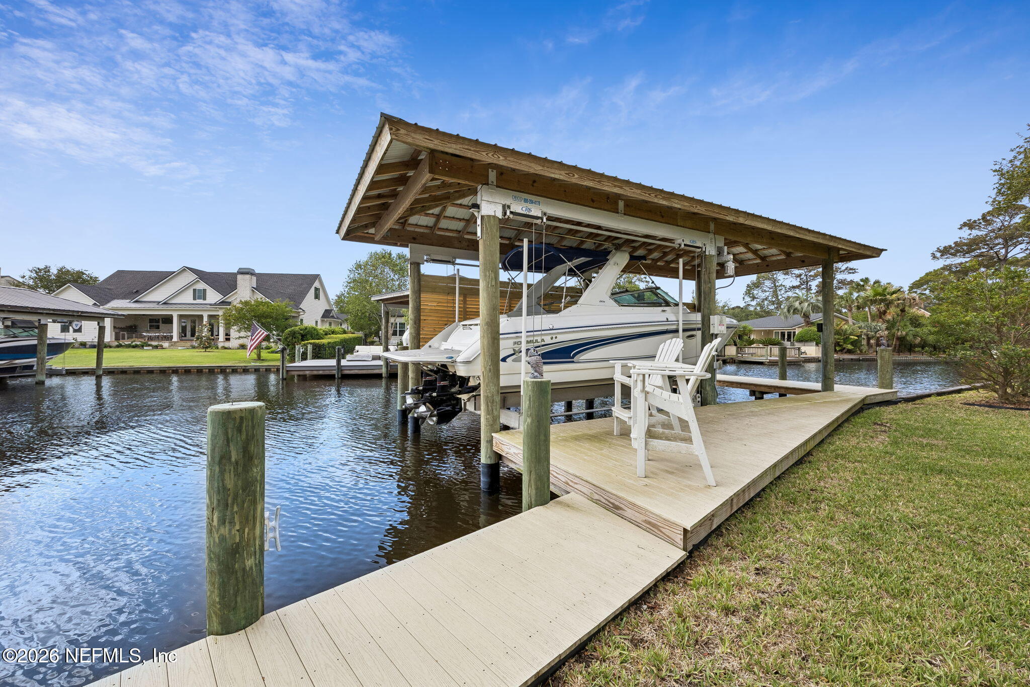5135 Pirates Cove Road Jacksonville, FL 32210 - Photo 35 of 43 Dock with lift