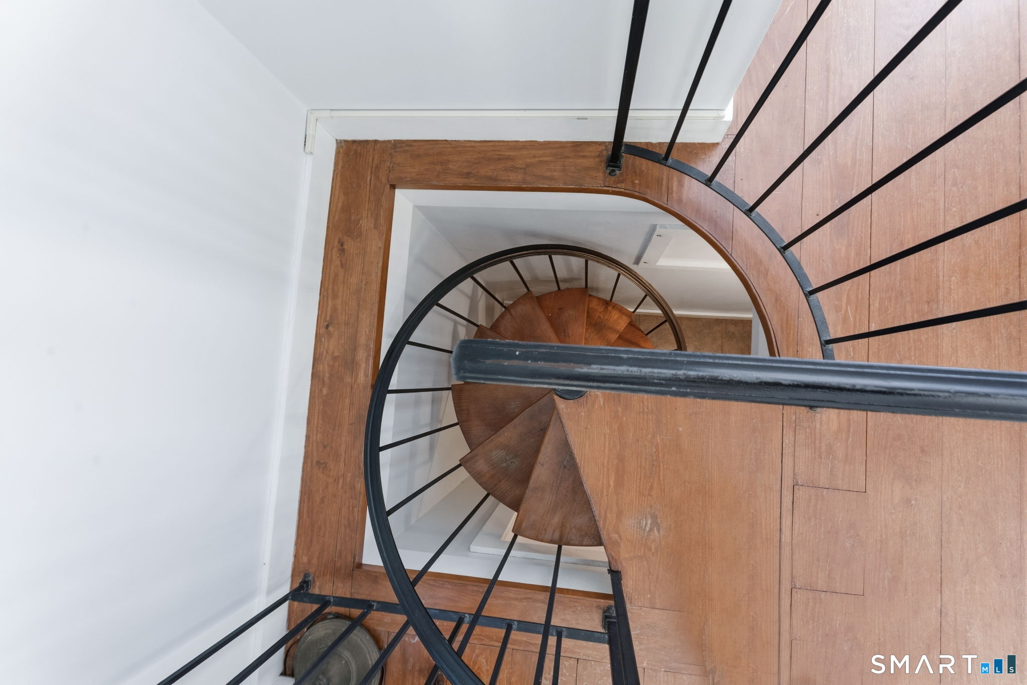 32 Juniper Road Bloomfield, CT 06002 - Photo 26 of 38 Spiral staircase to basement under addition