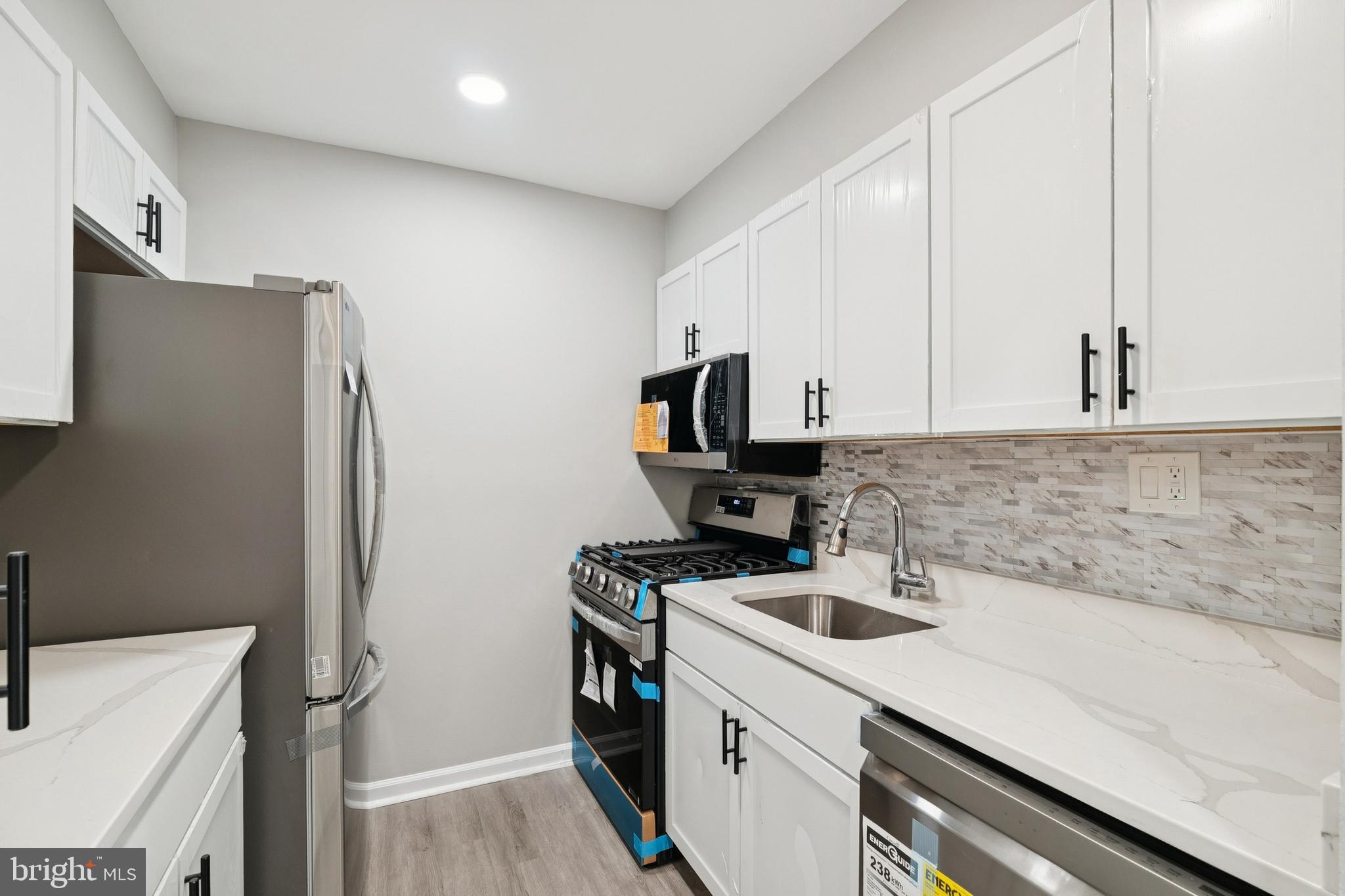 5806 Cove Landing Road, Unit 304 Burke, VA 22015 - Photo 2 of 15 Upgraded Cabinet & Stainless Steel Appliances