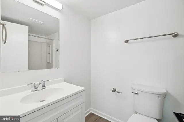 a bathroom with a sink and mirror