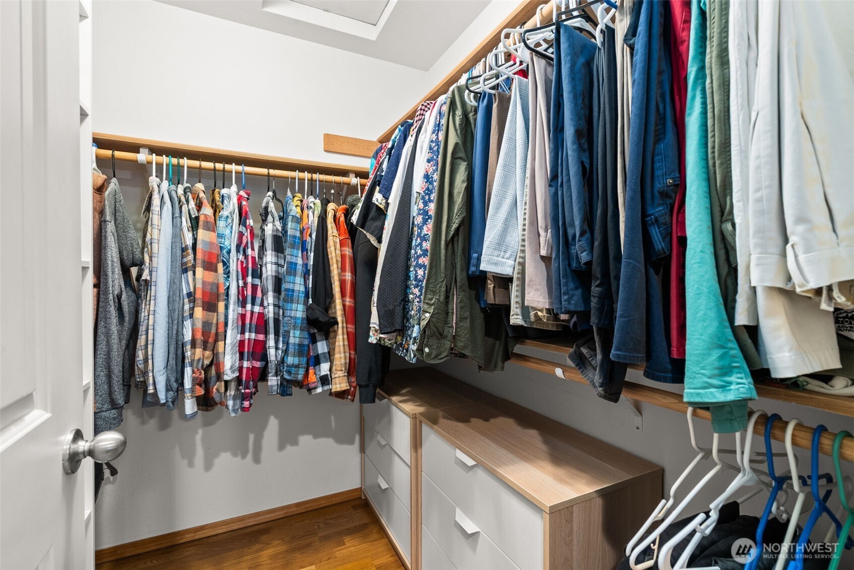 3426 Lady Fern Loop Northwest Olympia, WA 98502 - Photo 22 of 34 a view of walk in closet with clothes