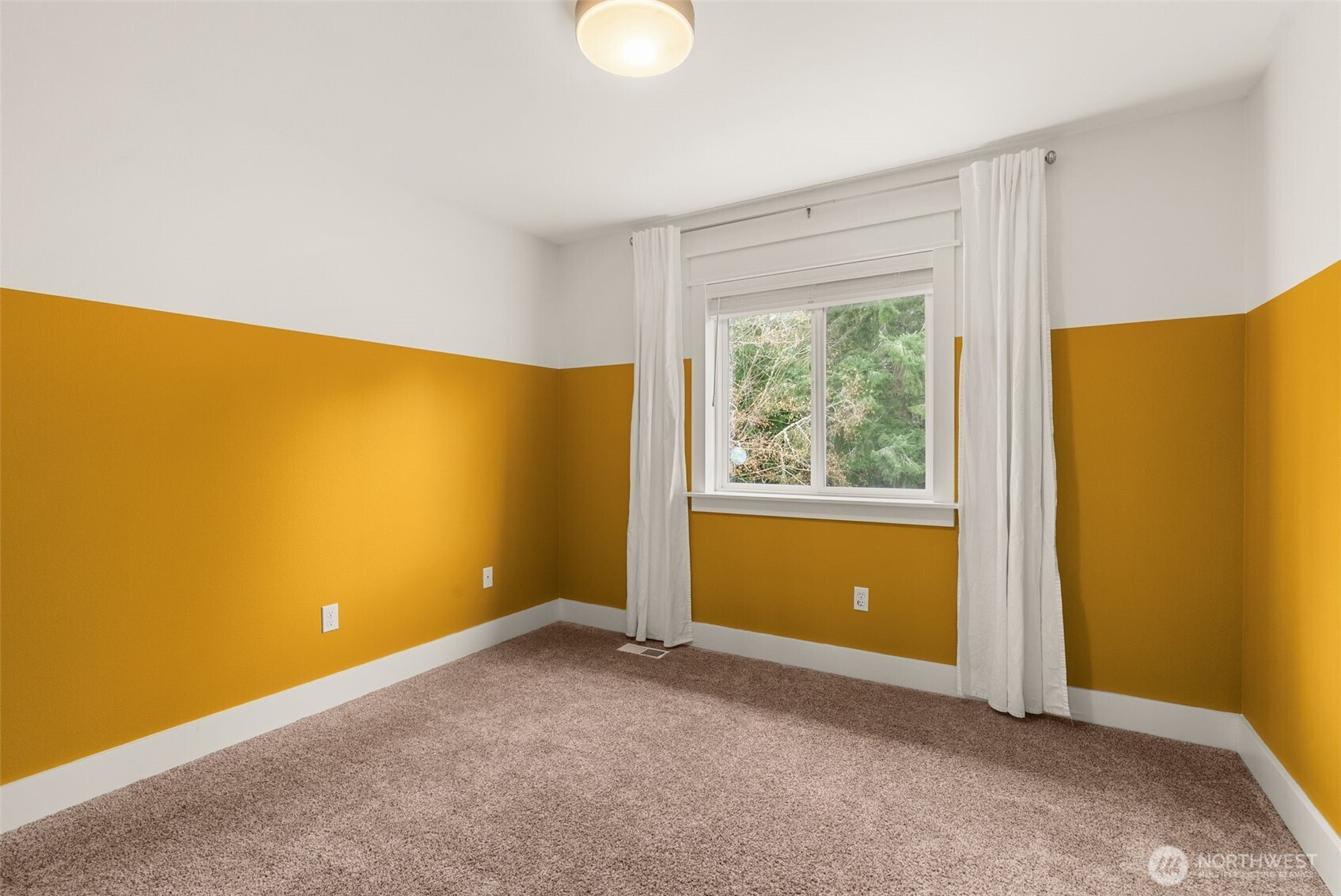 3426 Lady Fern Loop Northwest Olympia, WA 98502 - Photo 25 of 34 an empty room with windows and door