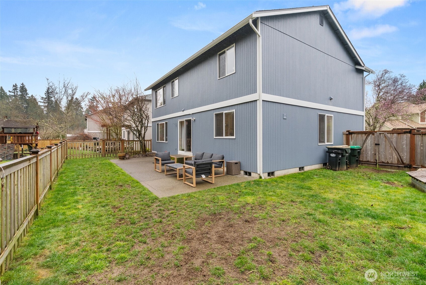 3426 Lady Fern Loop Northwest Olympia, WA 98502 - Photo 29 of 34 a view of a house with backyard and sitting area