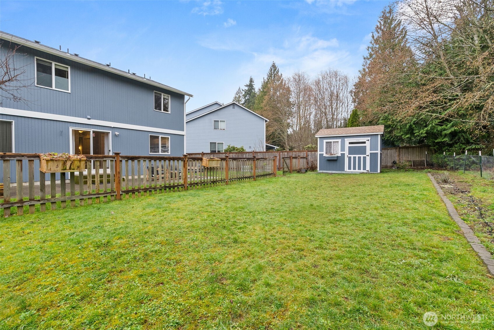 3426 Lady Fern Loop Northwest Olympia, WA 98502 - Photo 33 of 34 a house view with a outdoor space
