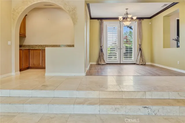 a room with furniture and a flat screen tv