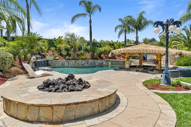 a garden view with a fountain