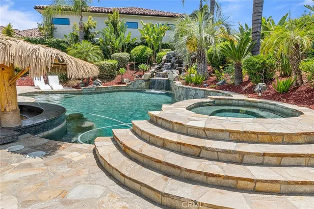 a garden view with a fountain