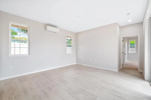 an empty room with windows