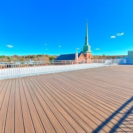 45 East Central Street, Unit 405 Natick, MA 01760 - Photo 11 of 21 a view of a balcony with wooden floor