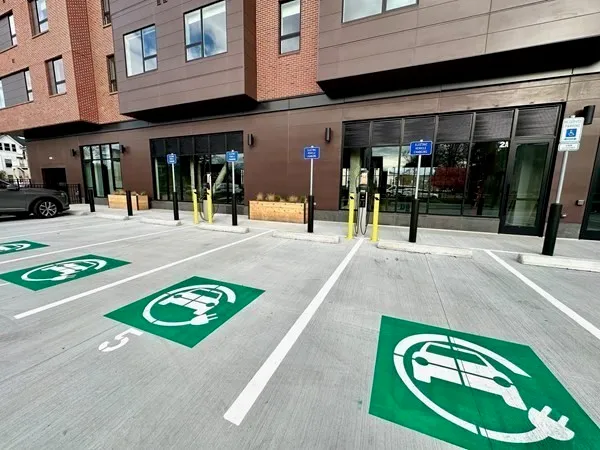 a view of a lobby with a tv and outdoor seating