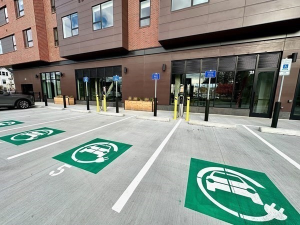 45 East Central Street, Unit 405 Natick, MA 01760 - Photo 15 of 21 a view of a lobby with a tv and outdoor seating