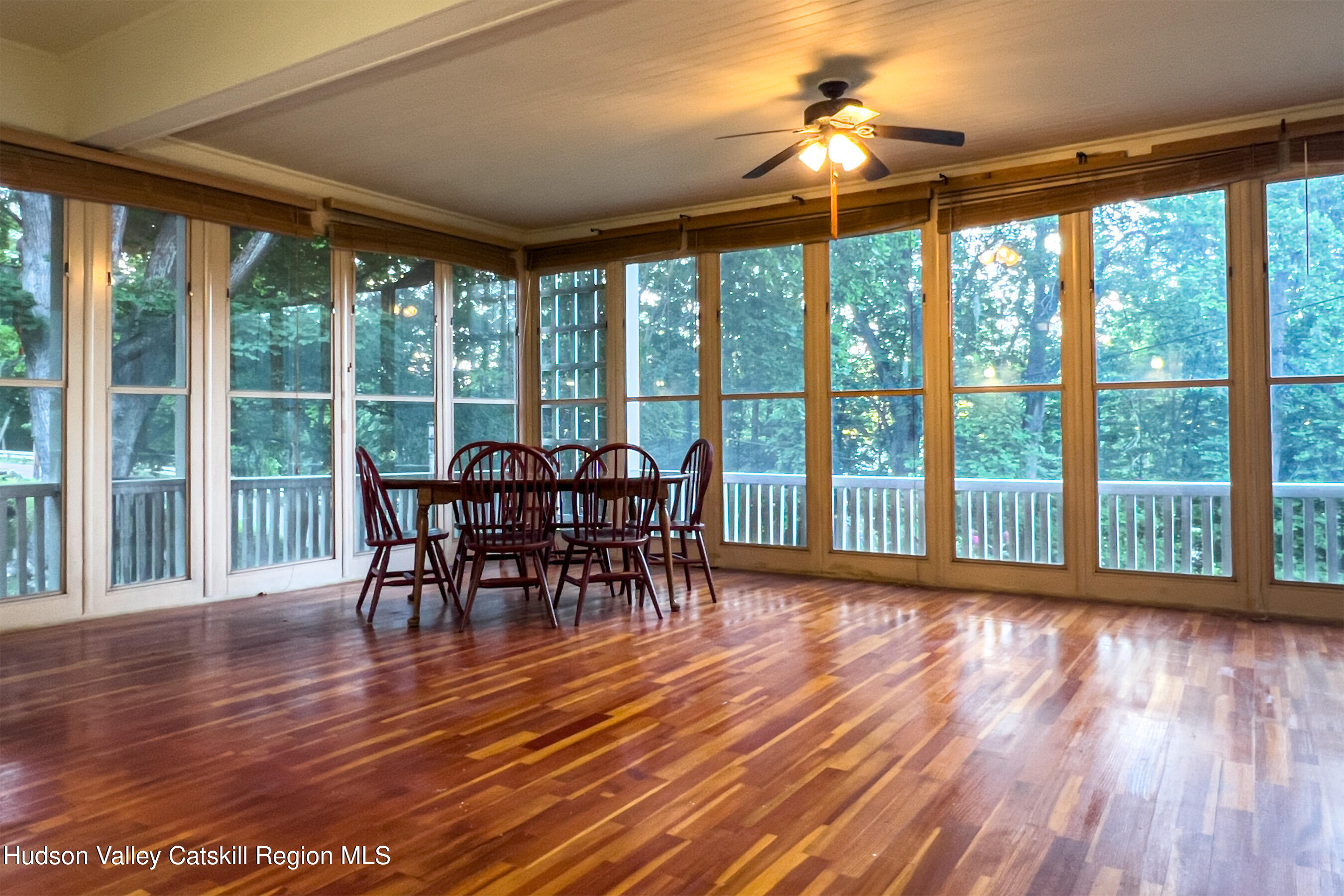 6 Westridge Road Cooperstown, NY 13326 - Photo 50 of 119 a view of a dining room with furniture window and wooden floor