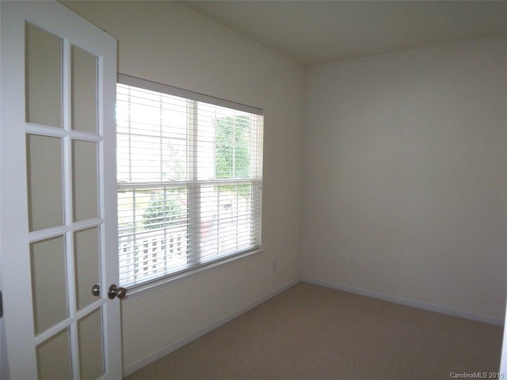13313 Chelsea Ridge Lane Huntersville, NC 28078 - Photo 5 of 10 an empty room with a window