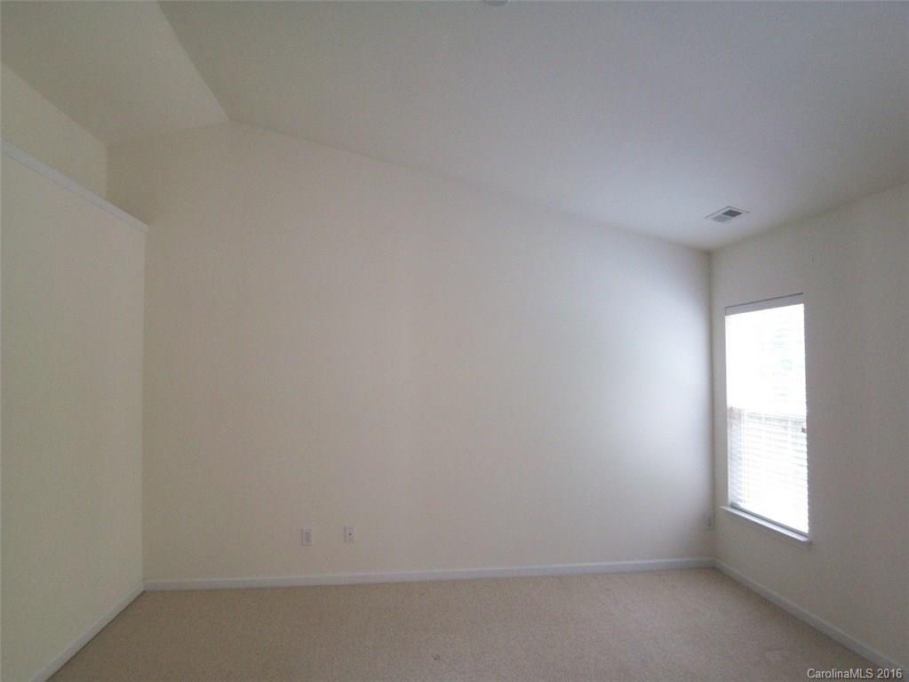 13313 Chelsea Ridge Lane Huntersville, NC 28078 - Photo 9 of 10 a view of an empty room and window