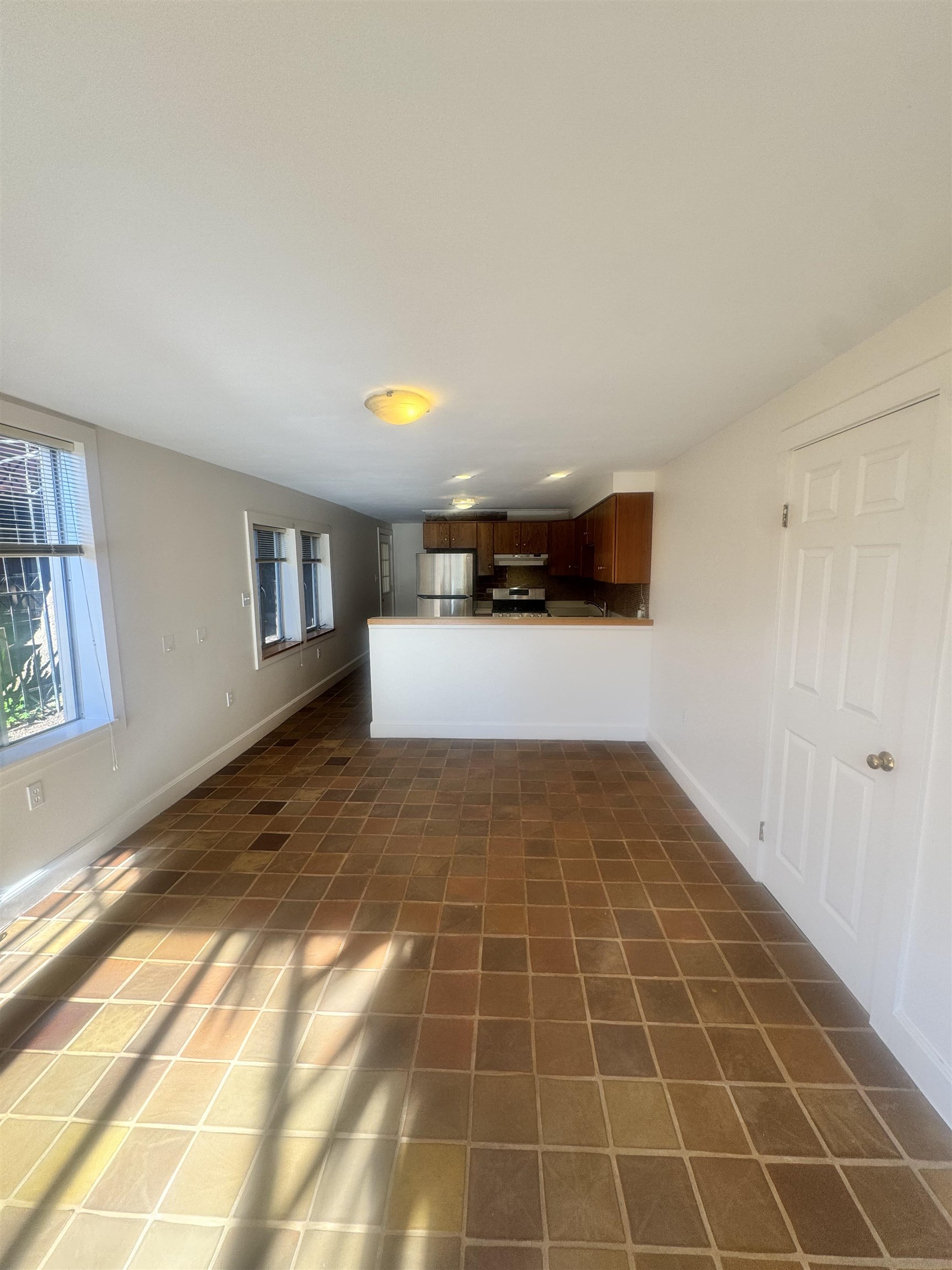1723 Carleton Street, Unit A Berkeley, CA 94703 - Photo 11 of 32 a view of an empty room and window