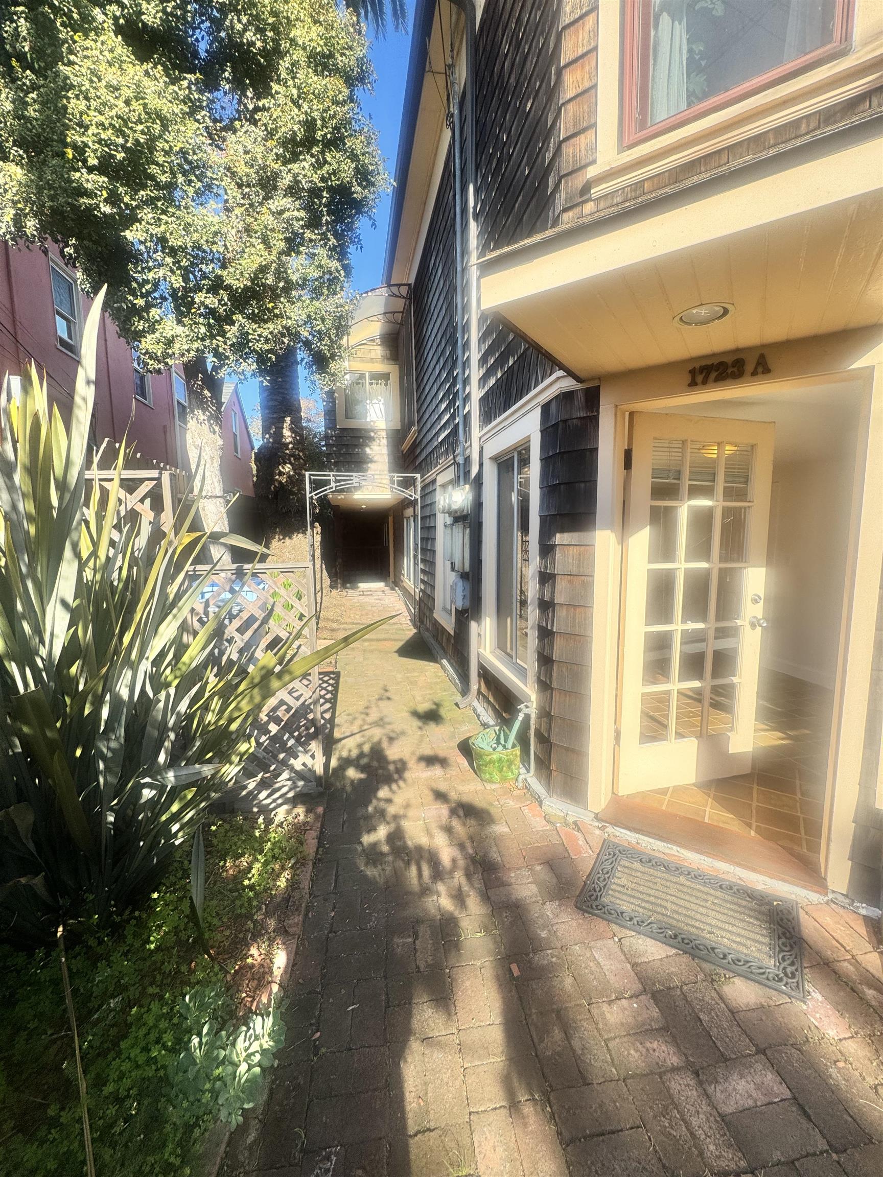 1723 Carleton Street, Unit A Berkeley, CA 94703 - Photo 2 of 32 a view of a house with a yard