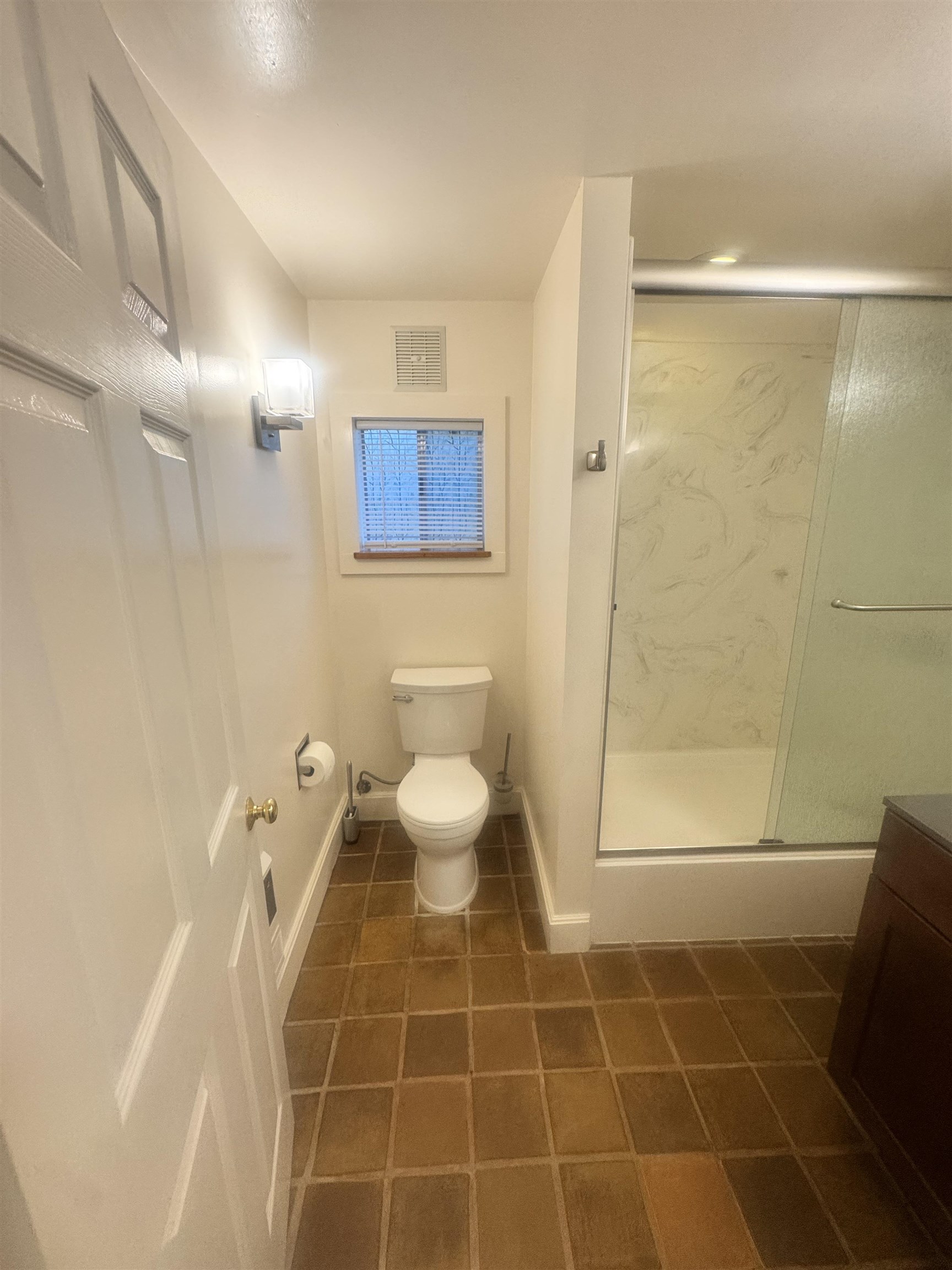 1723 Carleton Street, Unit A Berkeley, CA 94703 - Photo 27 of 32 a bathroom with a toilet and a shower