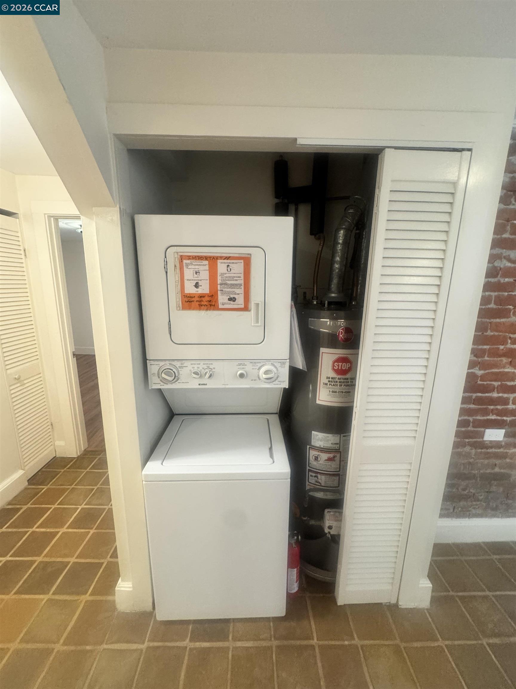 1723 Carleton Street, Unit A Berkeley, CA 94703 - Photo 30 of 32 a utility room with dryer and washer