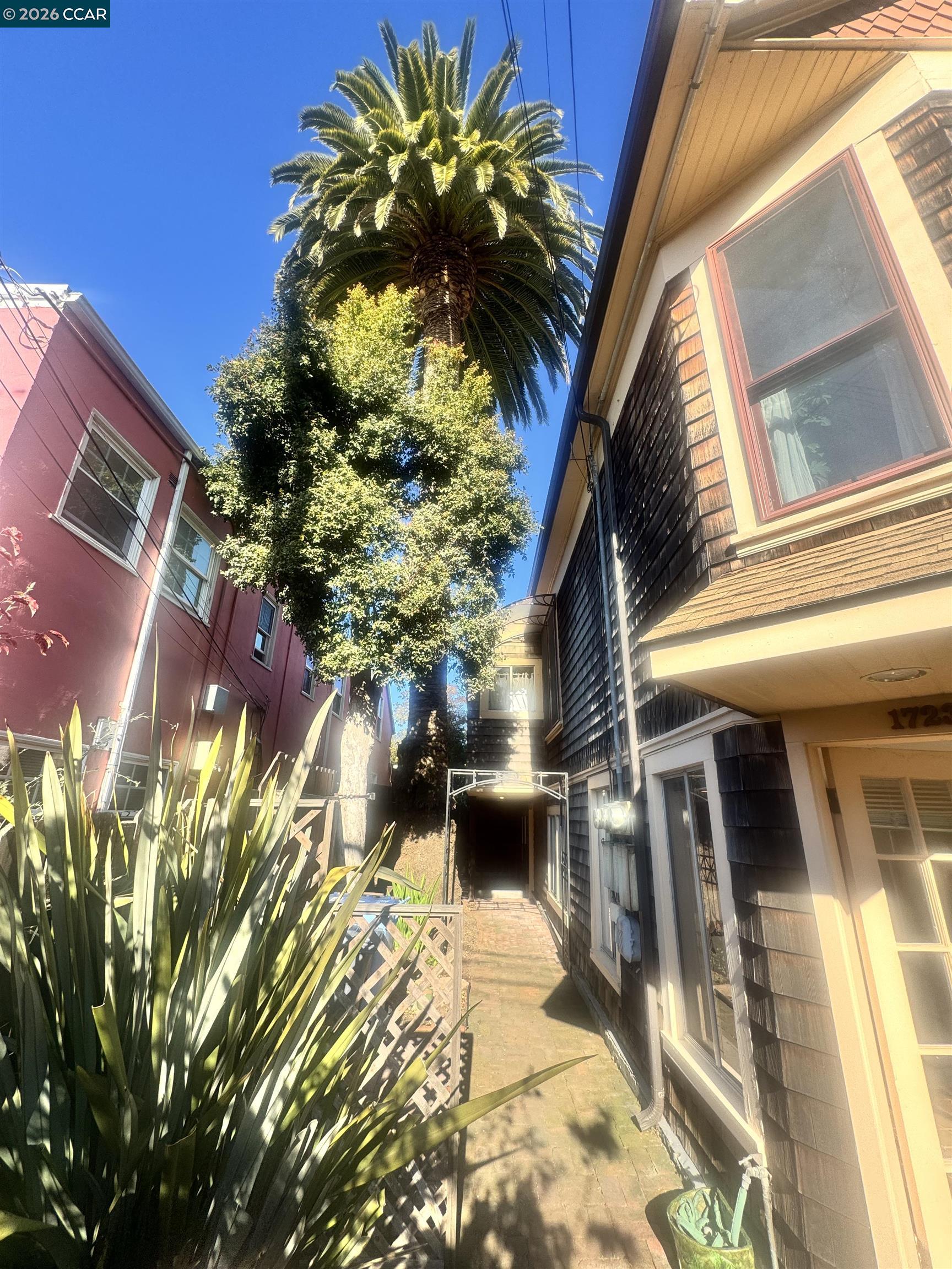 1723 Carleton Street, Unit A Berkeley, CA 94703 - Photo 4 of 32 a view of a house with a yard