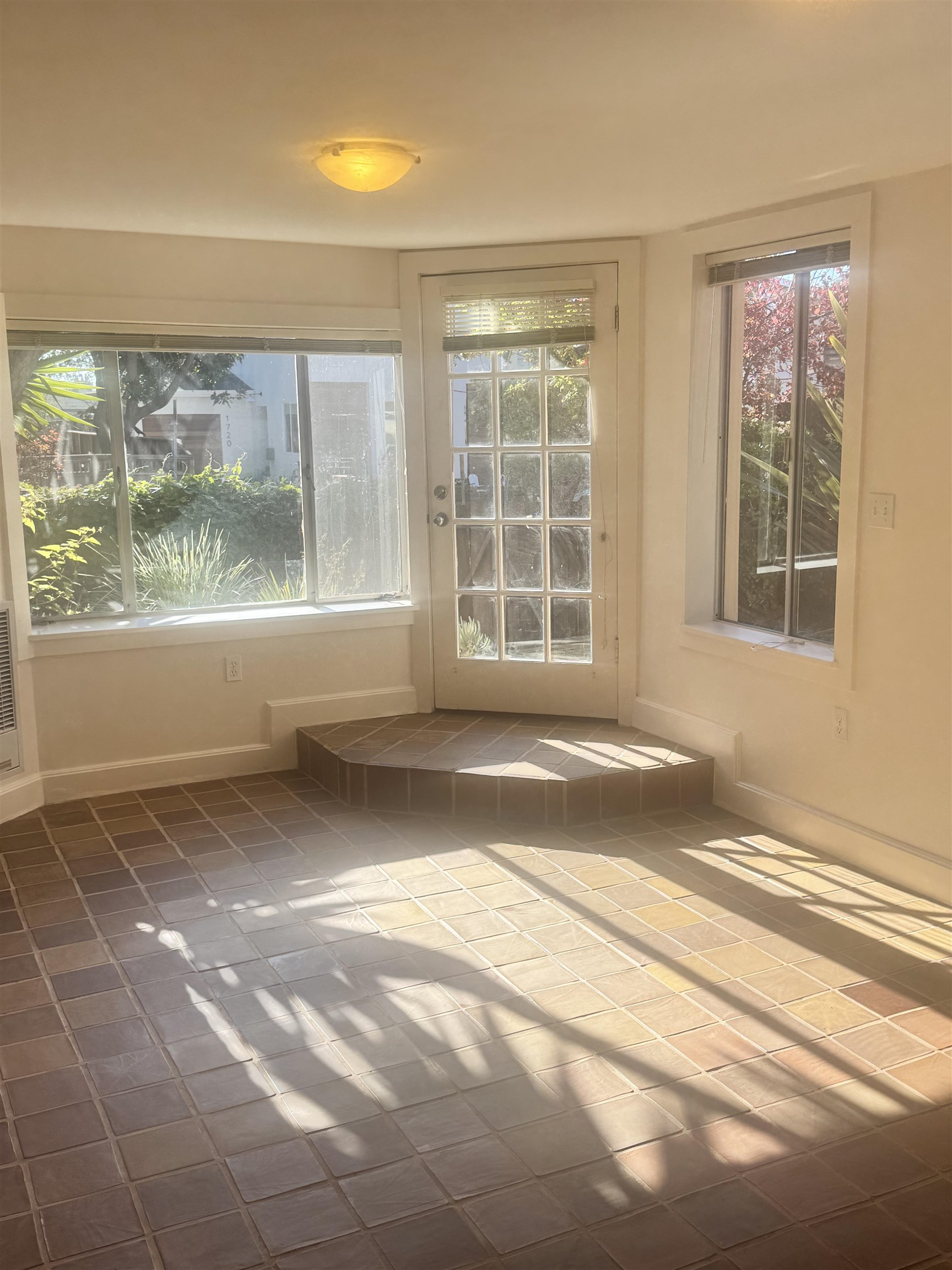 1723 Carleton Street, Unit A Berkeley, CA 94703 - Photo 10 of 32 a view of a room that has a window in it
