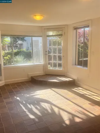 a view of a room that has a window in it