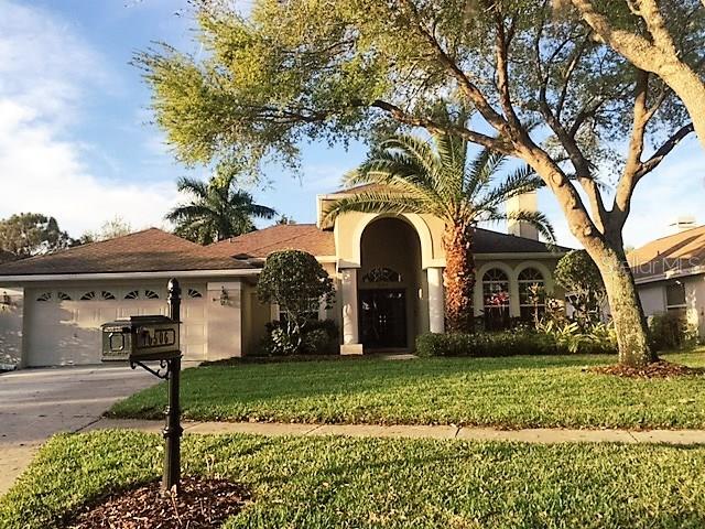 10506 Rochester Way Tampa, FL 33626 - Photo 1 of 1 a front view of house with yard