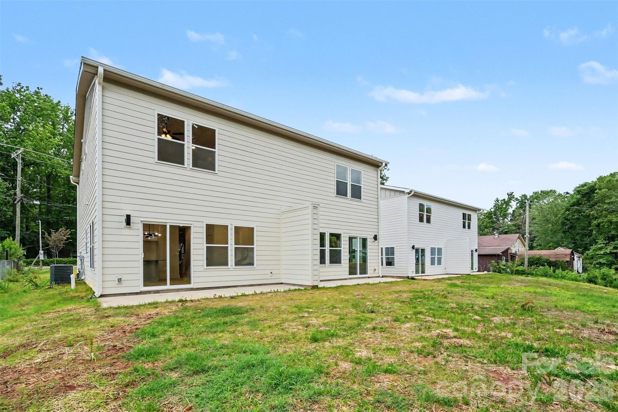 7521 Lawyers Road Charlotte, NC 28227 - Photo 29 of 35 a house view with a garden space