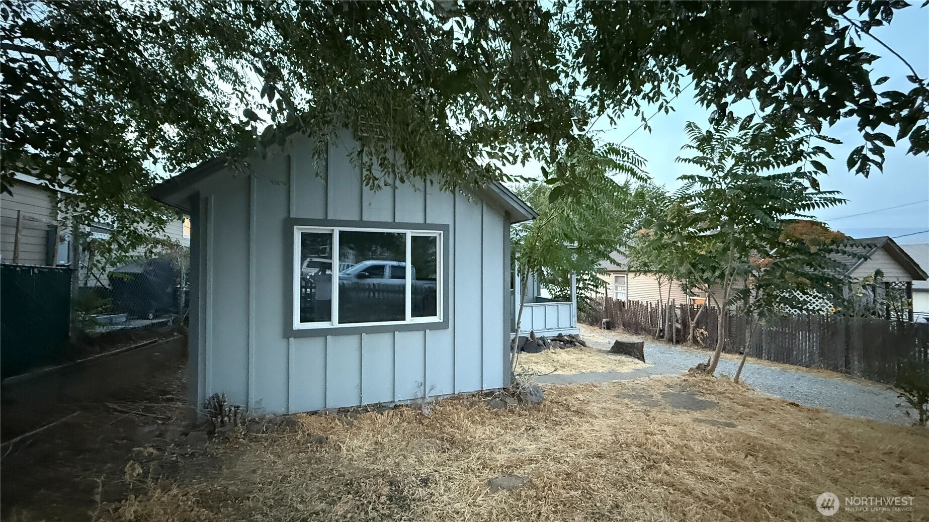 38 Viewdale Street Wenatchee, WA 98801 - Photo 32 of 34 a view of house with backyard and trees
