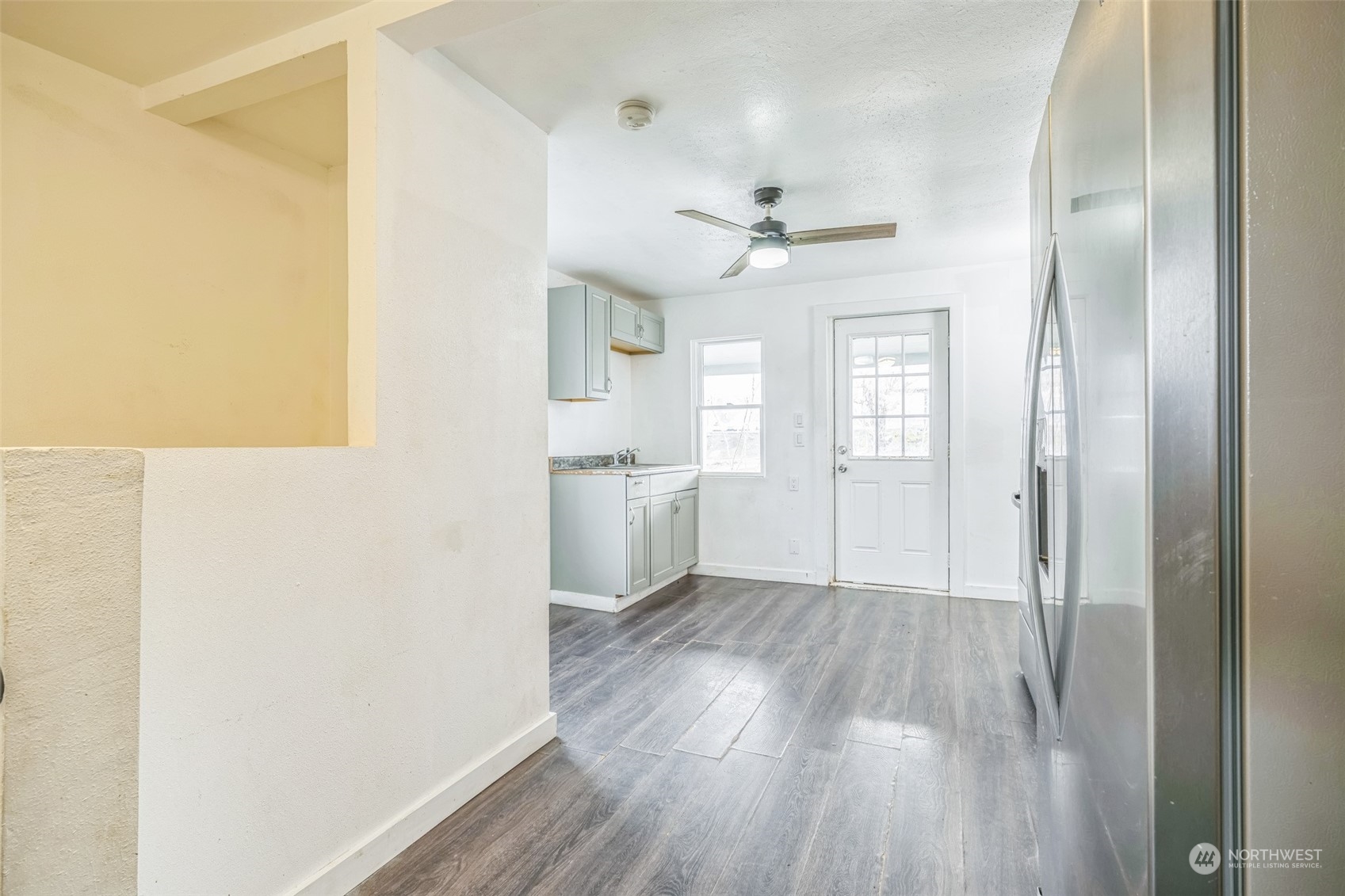 38 Viewdale Street Wenatchee, WA 98801 - Photo 7 of 34 a view of a kitchen with wooden floor and a kitchen space