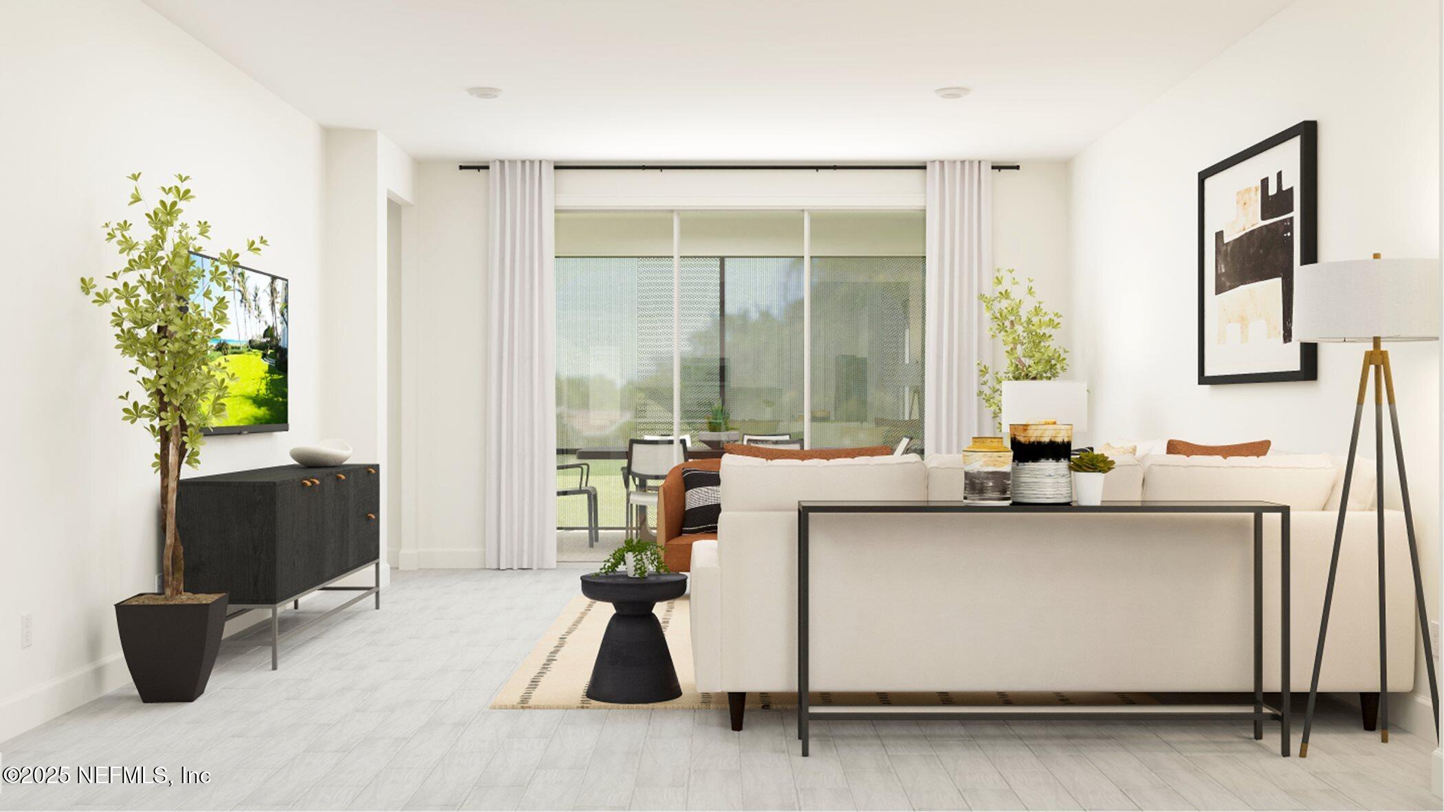 386 Hasler Avenue St. Augustine, FL 32092 - Photo 20 of 32 a view of living room with furniture and a potted plant